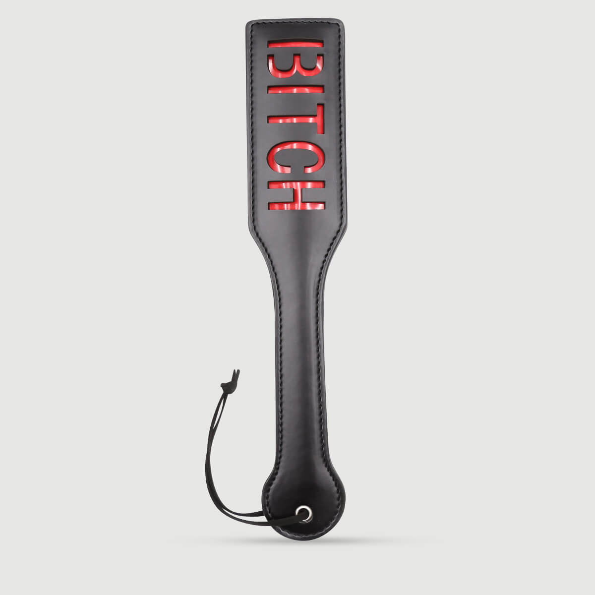 Δερμάτινο Paddle Με Χάραξη BITCH Domme Series Leather Paddle With BITCH Cutout – Μαύρο by Sexopolis