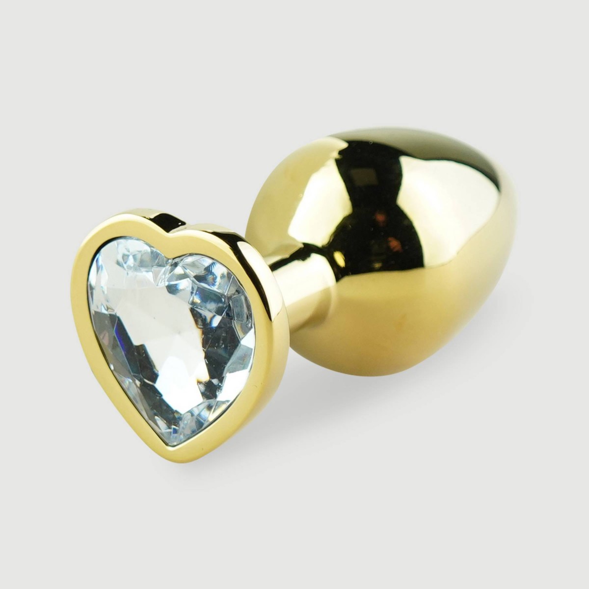 Μεταλλική Πρωκτική Σφήνα με Κόσμημα Καρδιά Anal Collection Medium Metal Butt Plug with Heart Jewel - Χρυσό/Διάφανο by Sexopolis