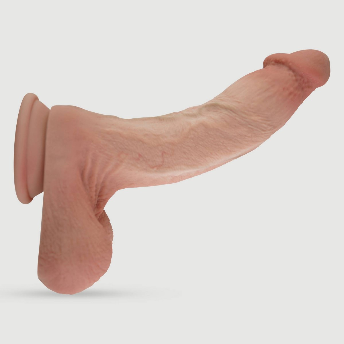 Μεγάλος Κυρτός Ασύρματος Ρεαλιστικός Δονητής Σιλικόνης Με Όρχεις & Βεντούζα Tasma 27,5 cm - Φυσικό Χρώμα by Sexopolis